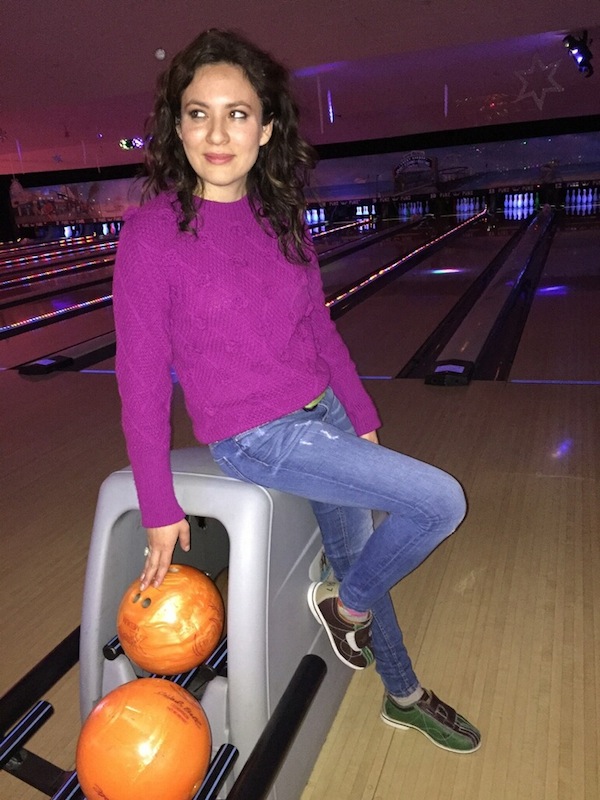 Fashion blogger goes bowling wearing Zara Jeans Prada Belt and Darling pink sweater