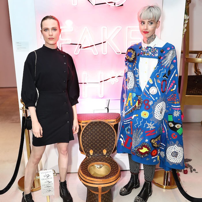 Evan Rachel Wood and artist Illma Gore pose next to Louis Vuitton Toilet in LA
